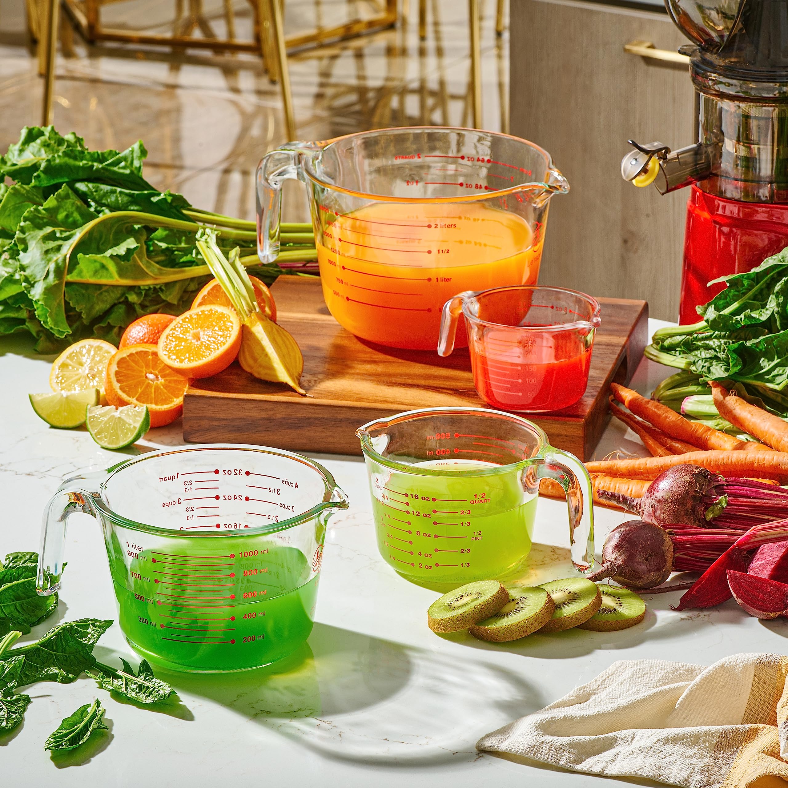 Le'raze pouring batter from 2-cup glass into bowl demonstrating controlled pouring benefit