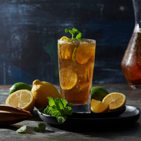 Le'raze tall glass with iced coffee illustrating cold-drink suitability