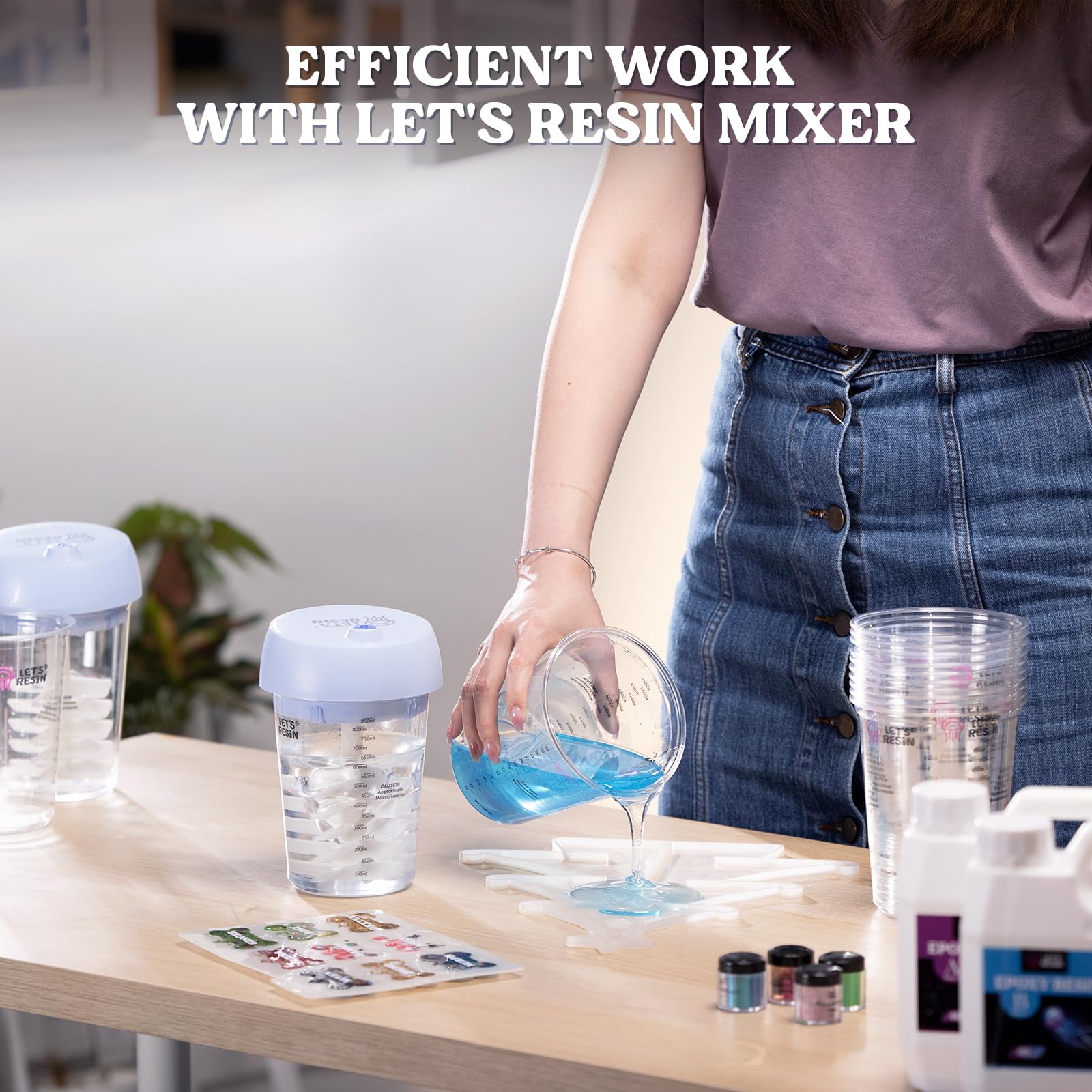 LET'S RESIN cups arranged on workbench with tools, supports organized craft workflow