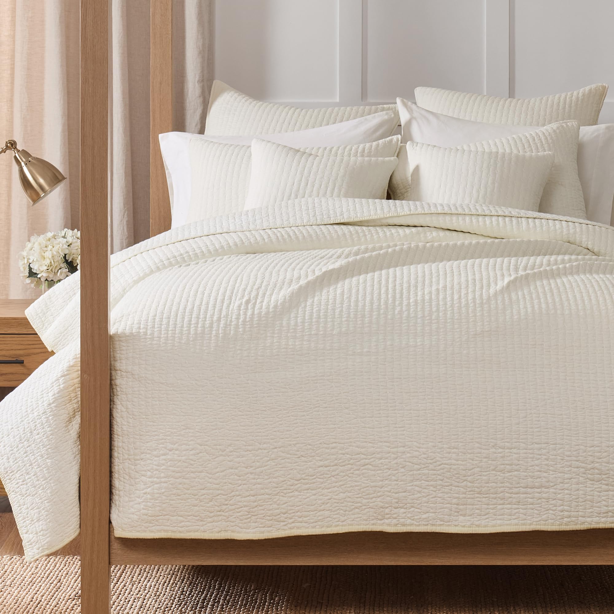 Levtex Home styled bedroom with quilt creating spa-like, minimalist ambiance