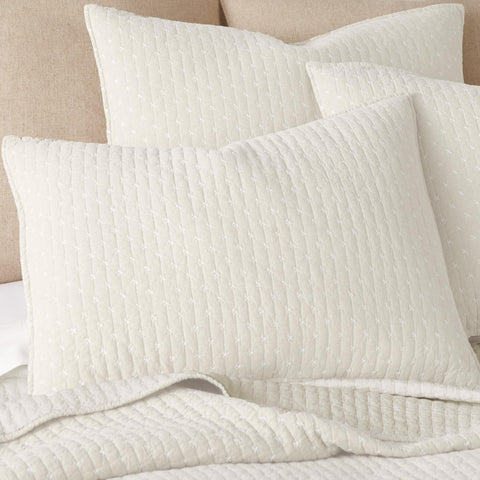 Levtex Home quilt edge and reinforced stitching demonstrating durability and shape retention