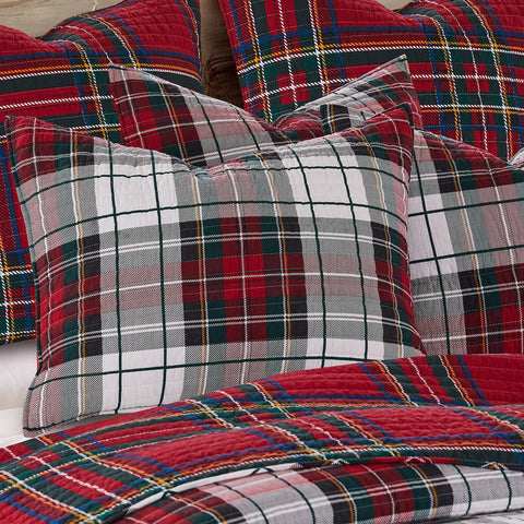 Levtex Home Spencer Plaid styled on bed illustrating warm holiday bedroom decor