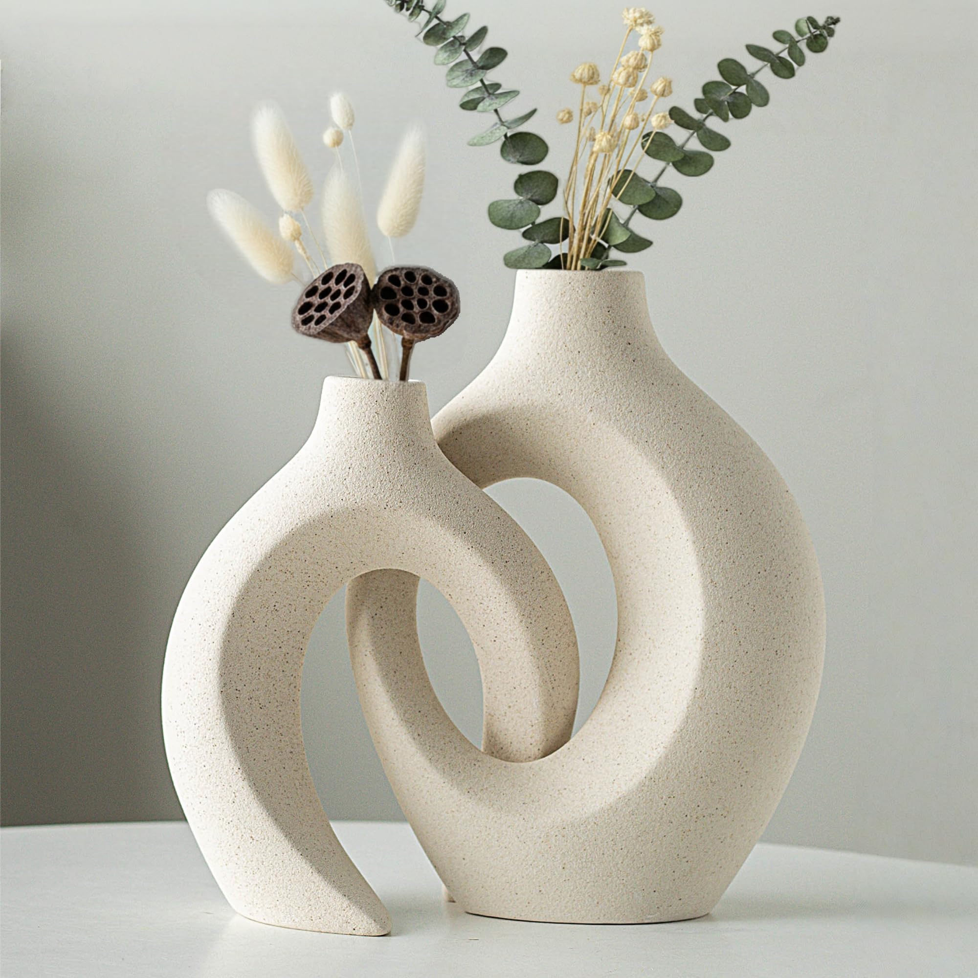 Levvohd front view of both vases showing sculptural hollow and matte finish