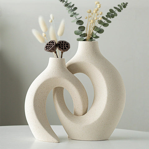 Levvohd front view of both vases showing sculptural hollow and matte finish