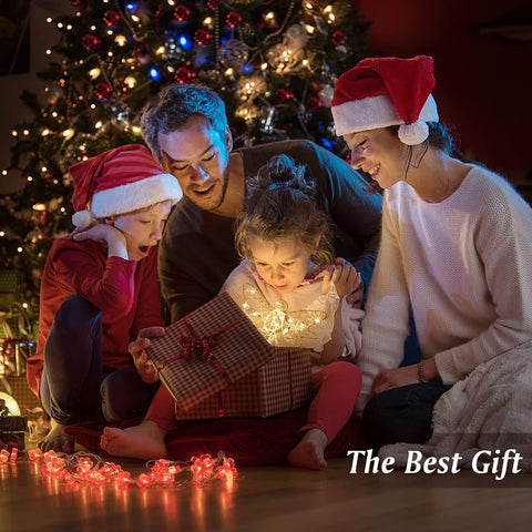 Lewondr angel on decorated living room tree creating festive focal point