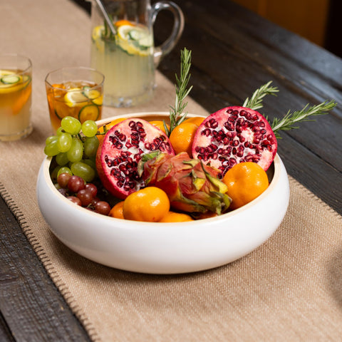 LEXA bowl next to fruit demonstrating scale and generous serving size