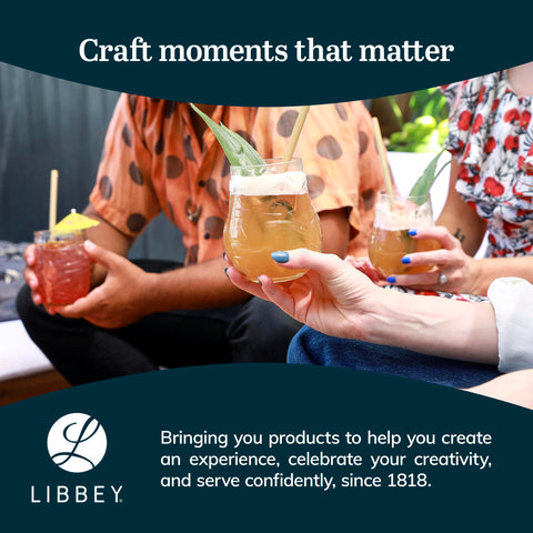 Hand holding Libbey pineapple glass to show scale and comfortable grip