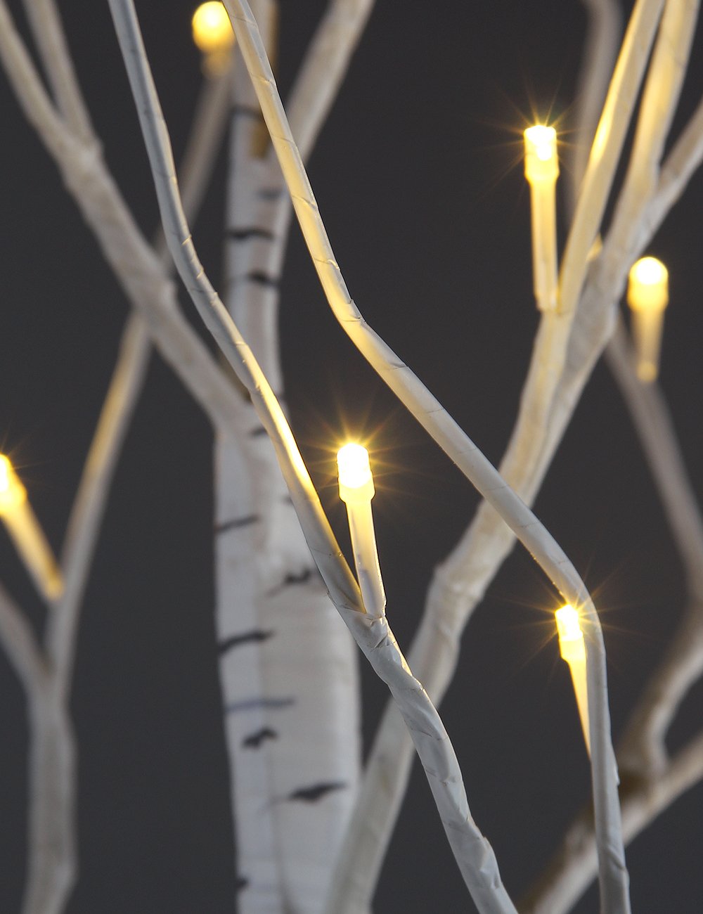 LIGHTSHARE tree on a patio creating festival-ready outdoor atmosphere