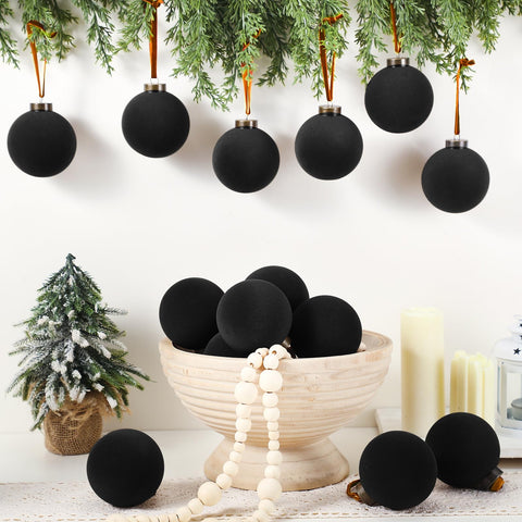 Liliful black ornaments on tree providing dramatic contrast and depth