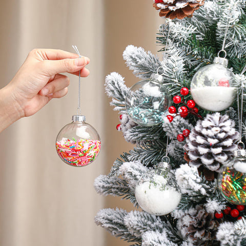 Liliful ornaments hung on a decorated Christmas tree adding elegant seasonal sparkle