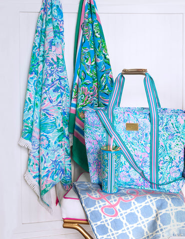 Lilly Pulitzer cooler tote on beach scene showing stylish picnic convenience