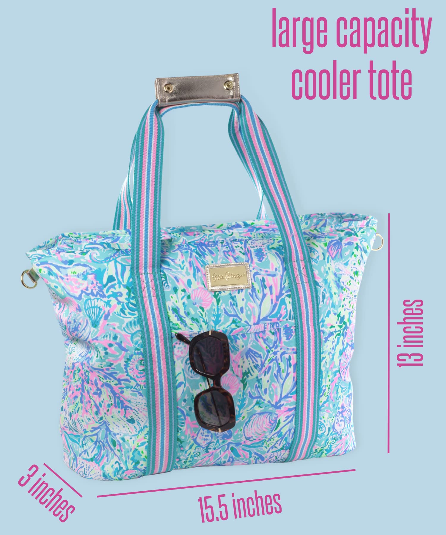 Lilly Pulitzer cooler next to beach towel showing size and packing advantage