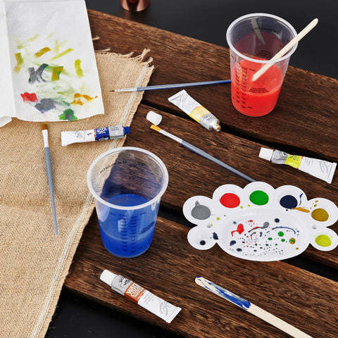 Lilymicky cup held in hand to show 10 oz scale and practical size