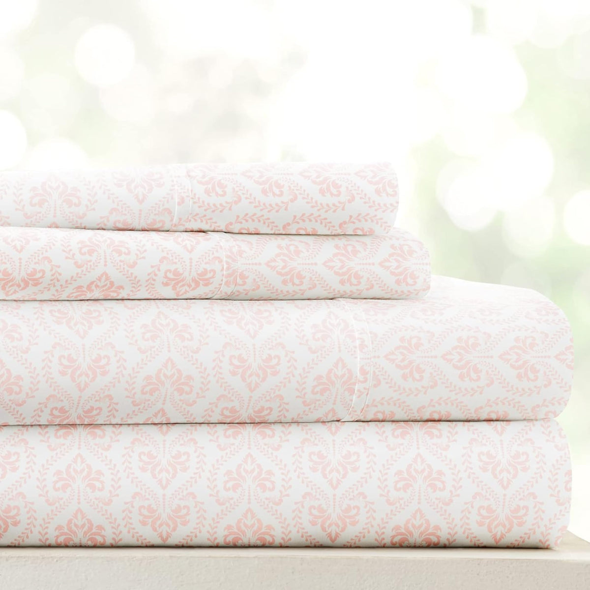 Linen Market front view of pink patterned queen sheet set showing neat bed styling and comfort