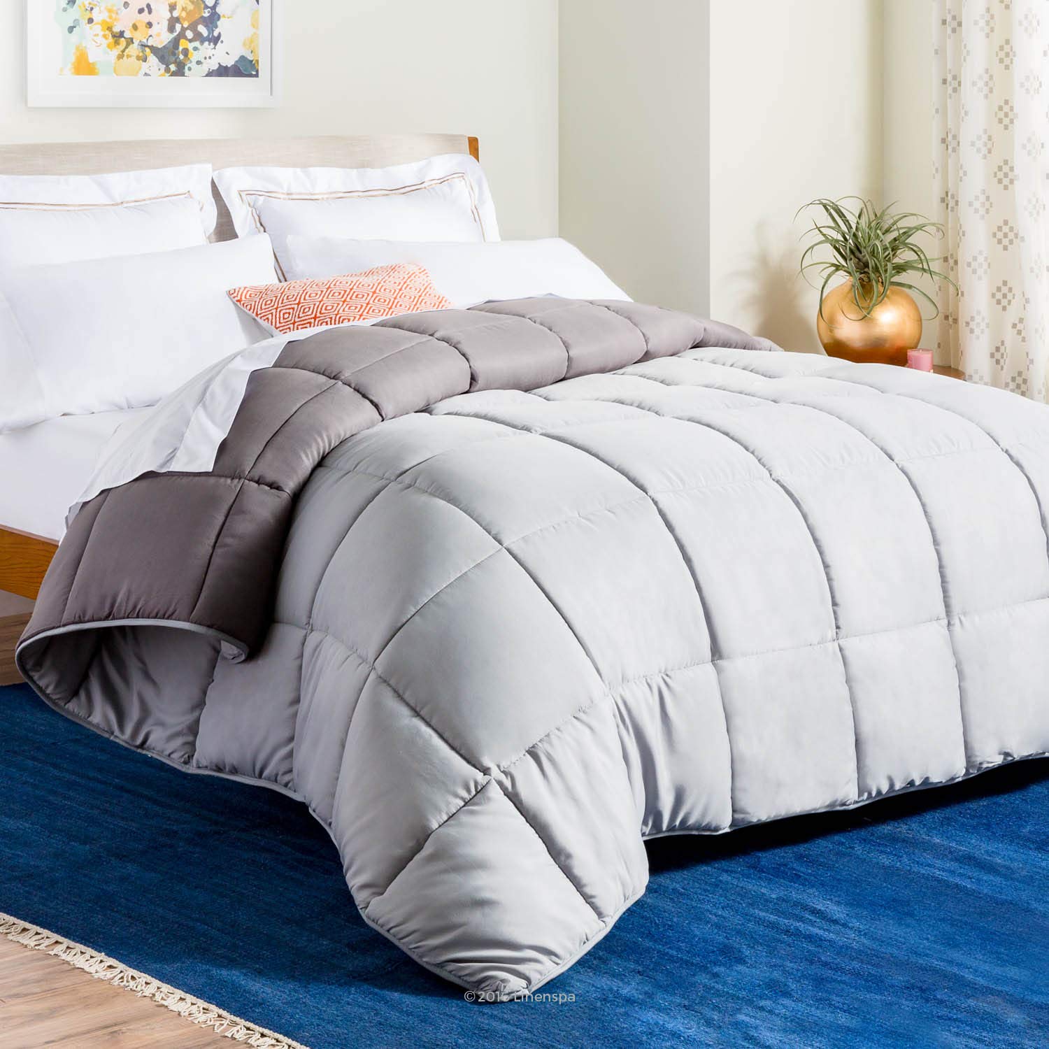 Linenspa front view stone and charcoal reversible comforter shows neat styling benefit