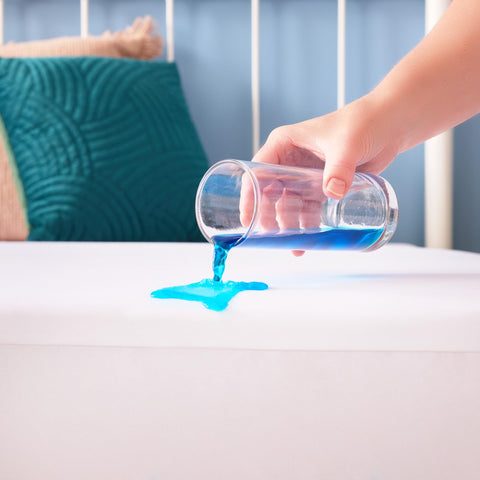Linenspa protector in a child’s room showing waterproof protection and spill safety