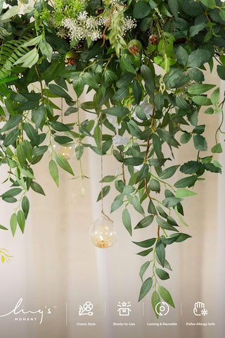 Ling's moment vines used on a wedding arch adding lush, maintenance-free greenery