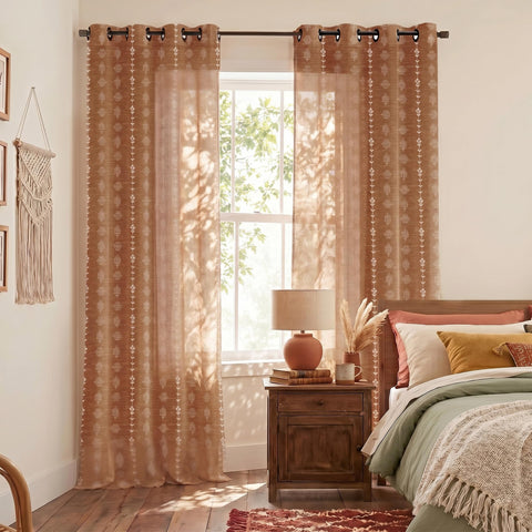 Lino Rosa front view of two burnt orange curtain panels showing full pattern and fit