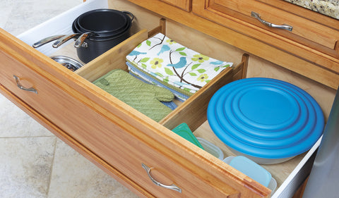 Lipper International divider installed in a drawer keeping utensils organized benefit