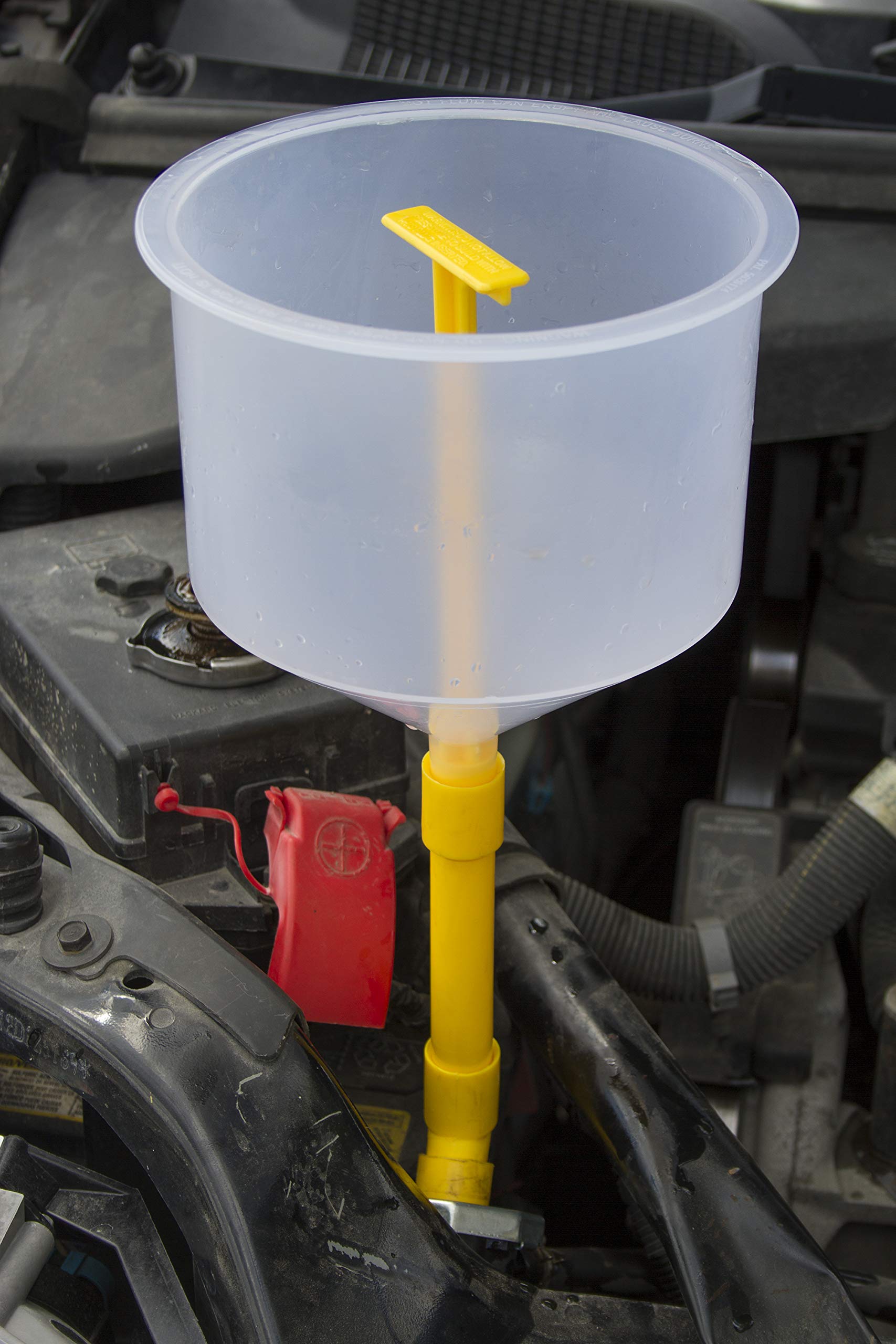Lisle 5 inch extension displayed for reaching recessed filler necks benefit