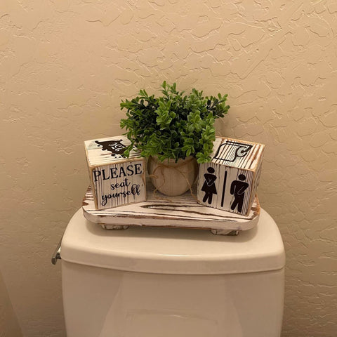 Liswit set placed on toilet tank demonstrating compact, space-saving benefit
