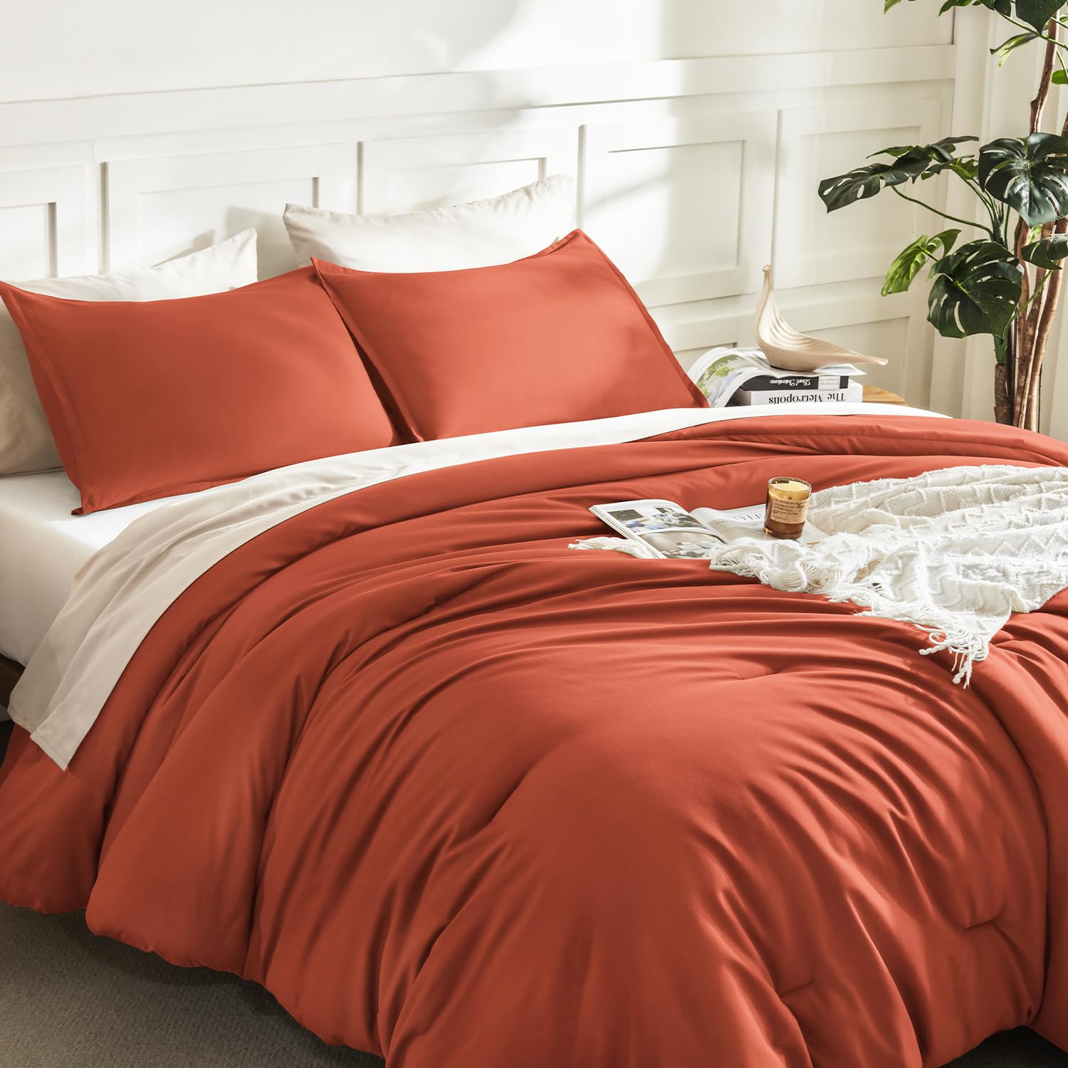 Litanika comforter on bed styled for color contrast and room coordination