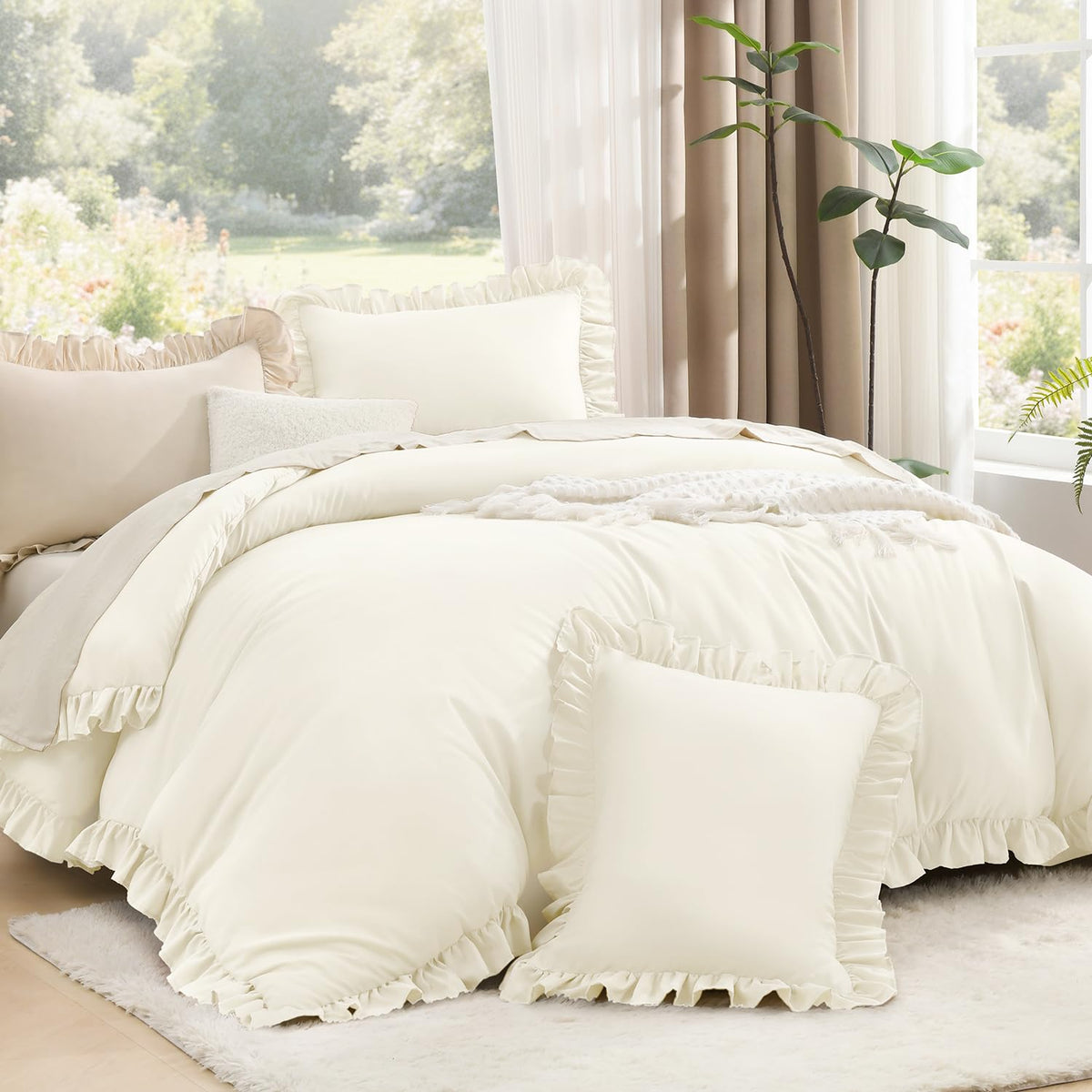 Litanika front view of full comforter showing ivory ruffles and elegant styling benefit