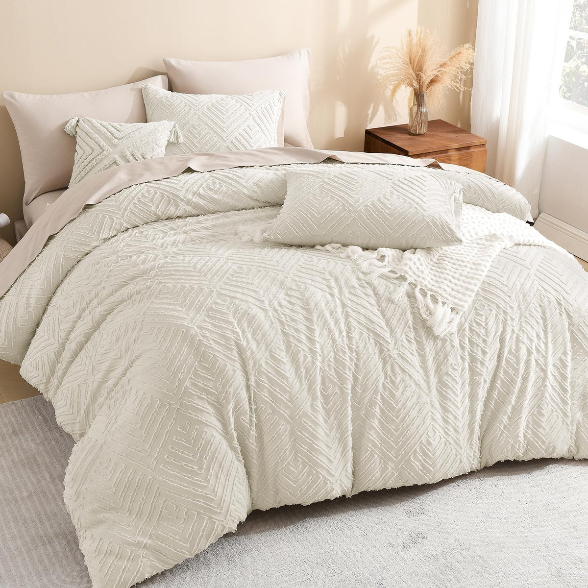 Litanika comforter front view showing beige tufted boho design and cozy appeal