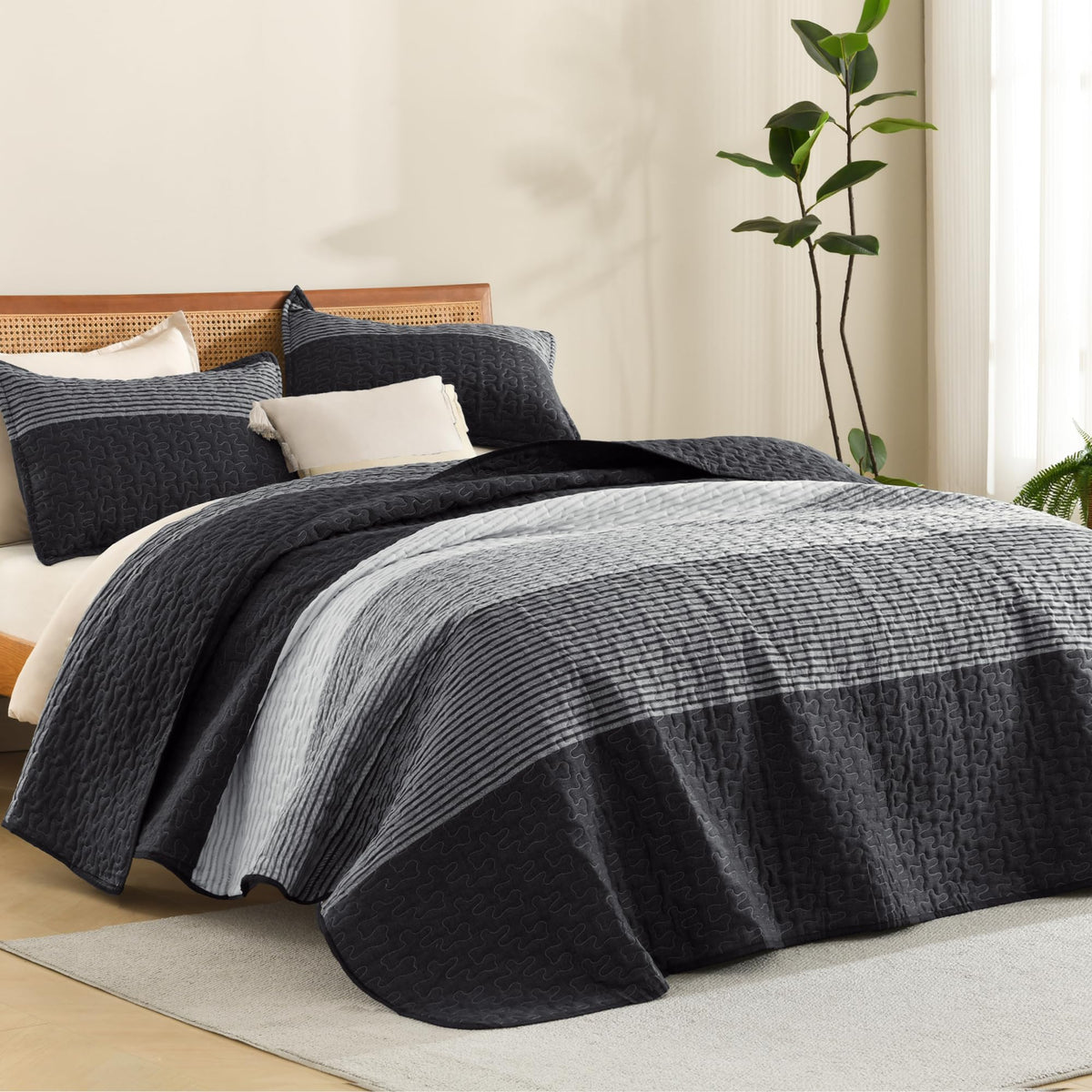 Litanika quilt front view showing black and white stripes and polished look
