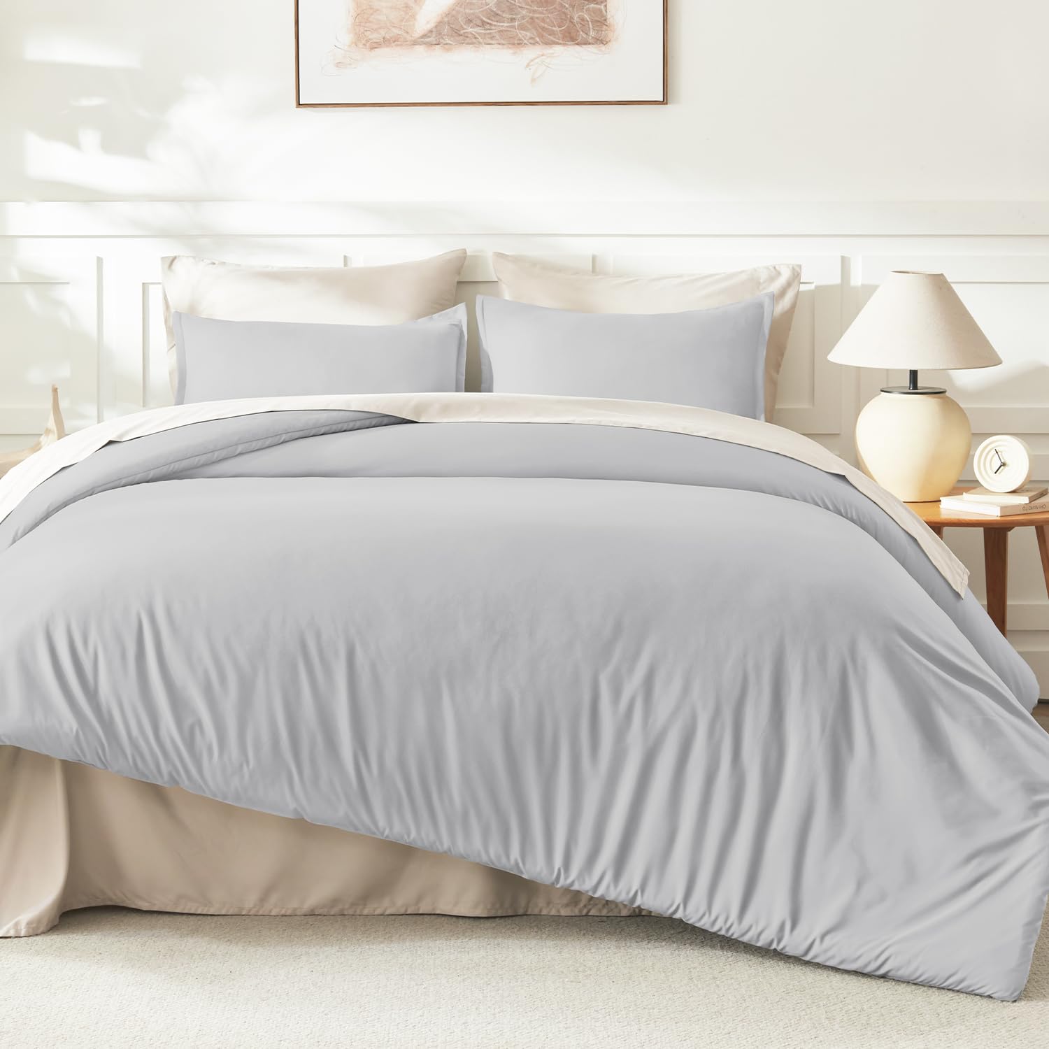 Litanika comforter next to mat to show king-size scale benefit