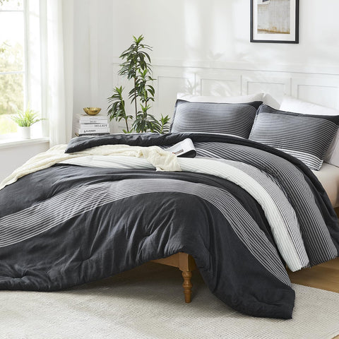 Litanika striped pattern detail showing bold black contrast and color patchwork
