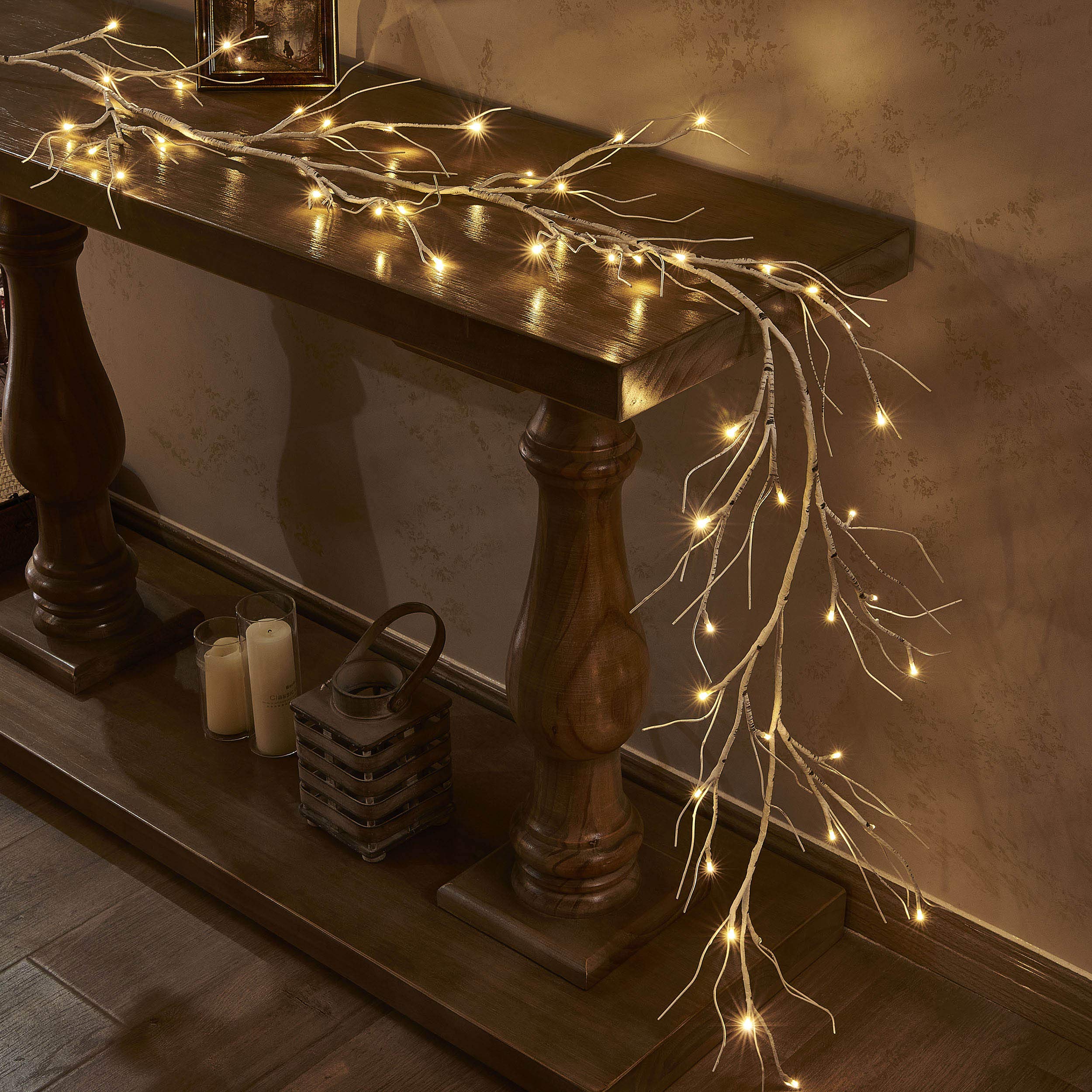 LITBLOOM garland on mantel showing natural birch look and cozy ambiance