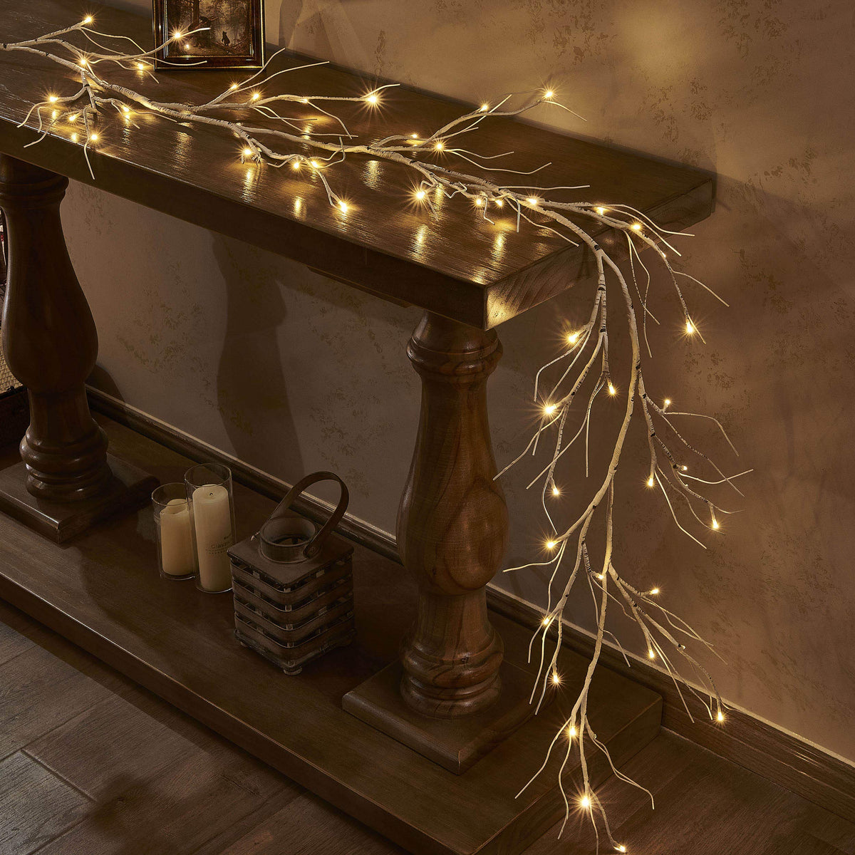 LITBLOOM garland on mantel showing natural birch look and cozy ambiance