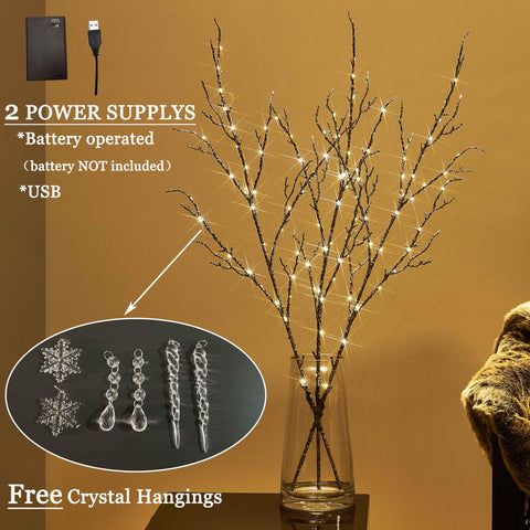 LITBLOOM branches arranged in a vase glowing warmly, creates ambient atmosphere