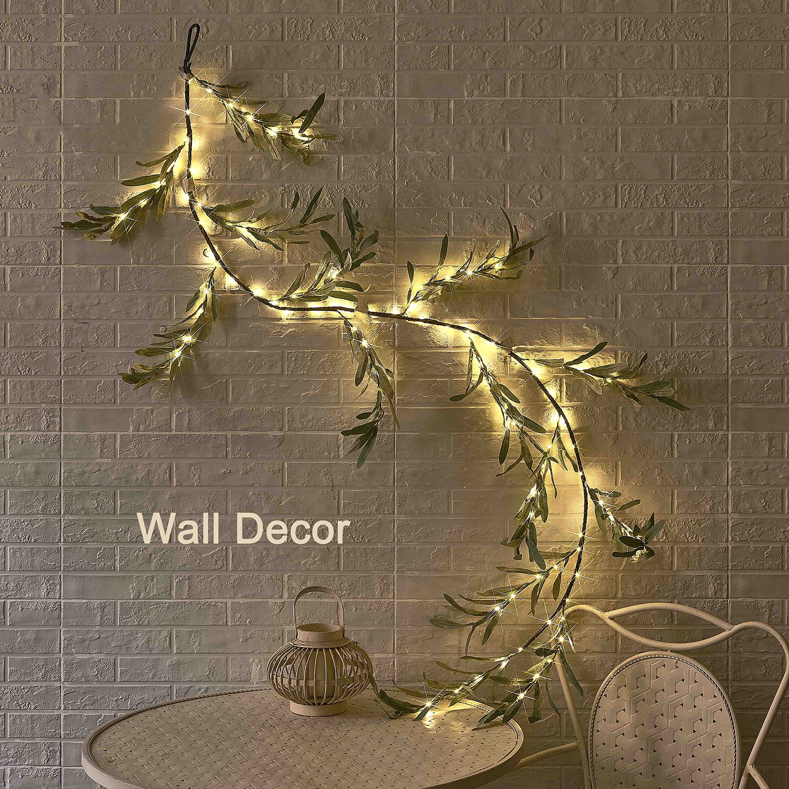 LITBLOOM garland next to a hand and visible battery box to show scale