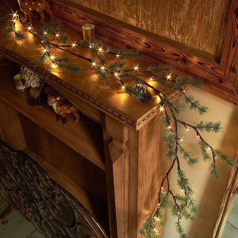 LITBLOOM mantle setup with garland draped to enhance mantel warmth and holiday style
