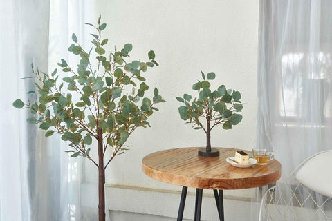 LITBLOOM tree on porch at night demonstrating outdoor waterproof lighting use