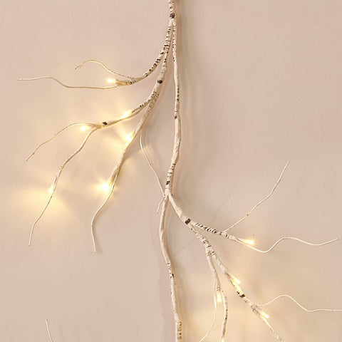 LITBLOOM garland as a table centerpiece creating intimate, decorative lighting
