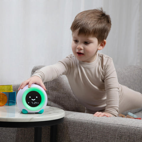LittleHippo Mella placed on a child's bedside table showing convenient nighttime use