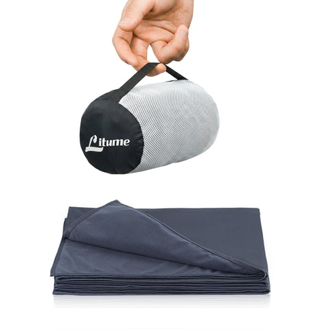 Litume dark blue gray front view compact travel blanket showing neat fold and color, ideal for travel