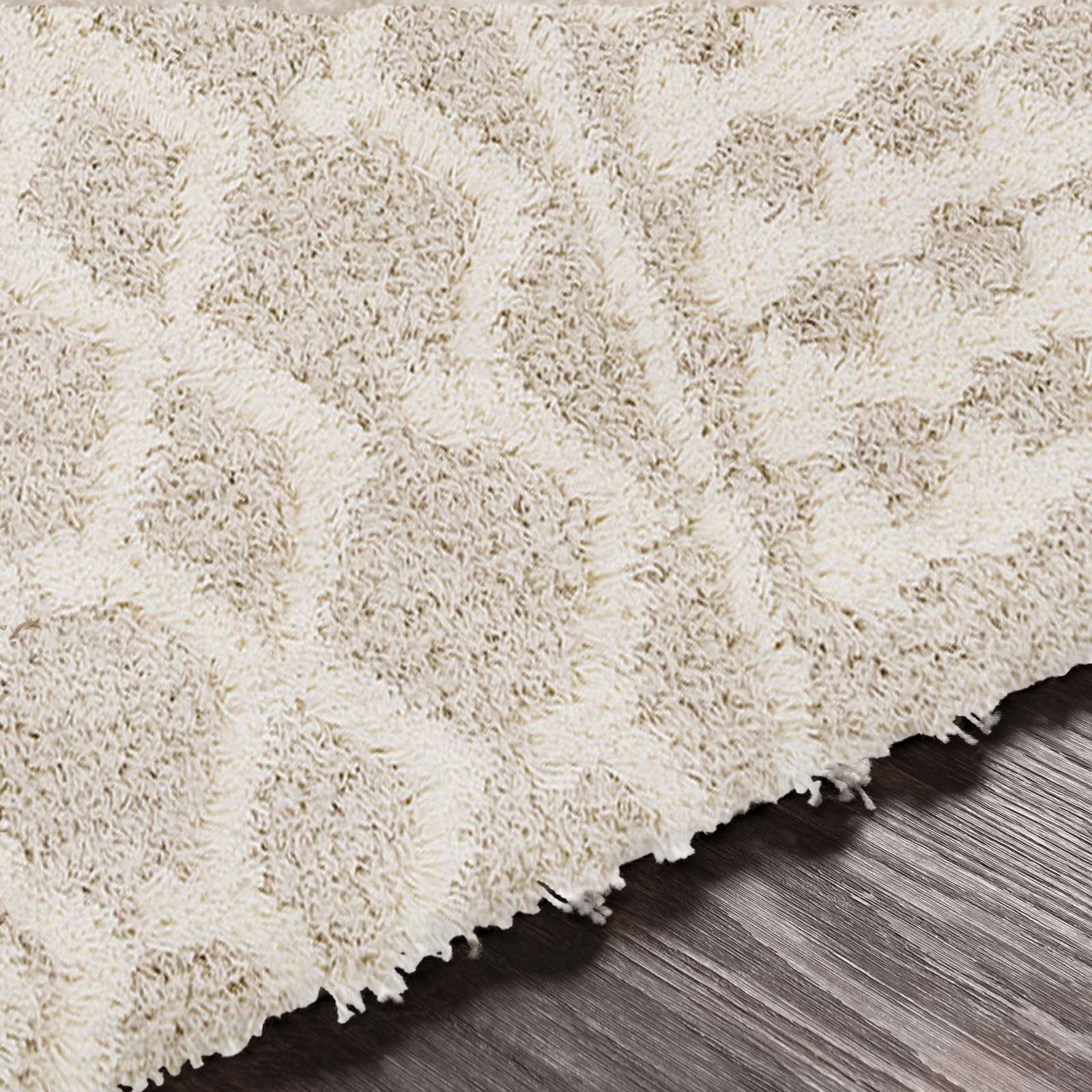 Livabliss scale image of rug under sofa to show actual 4'3" x 5'7" dimensions and fit
