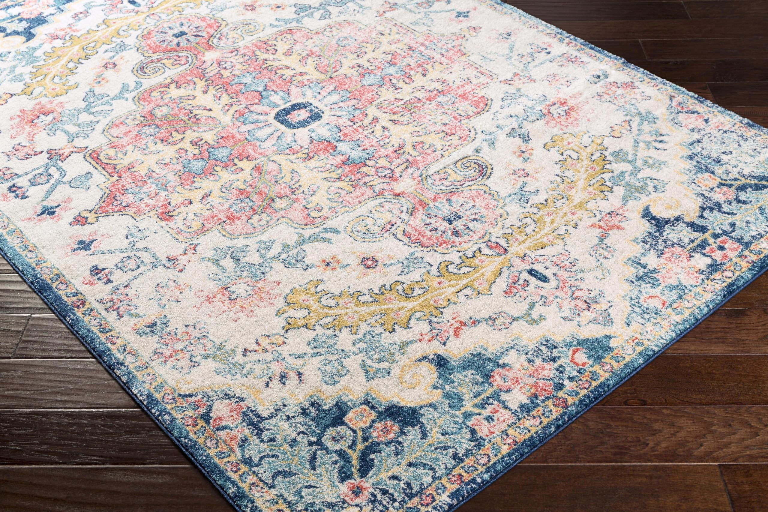 Livabliss rug beside chairs showing 5x7 scale for furniture placement and layout planning
