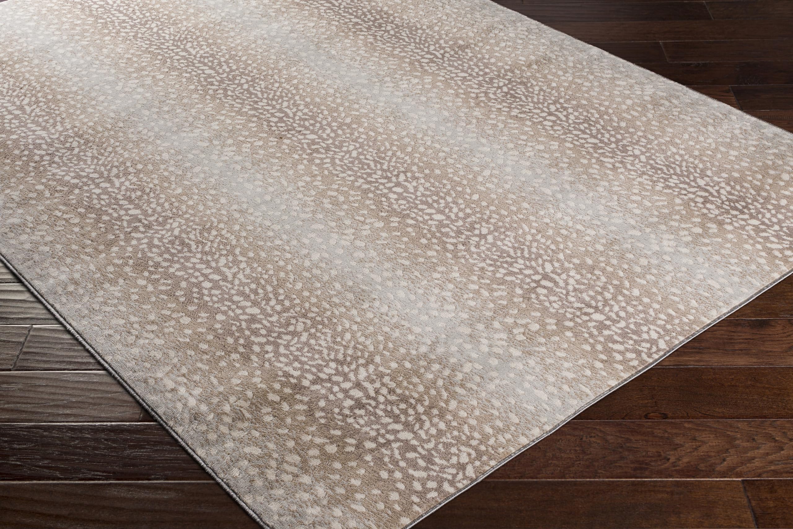 Livabliss rug under sofa showing scale and furniture compatibility benefit