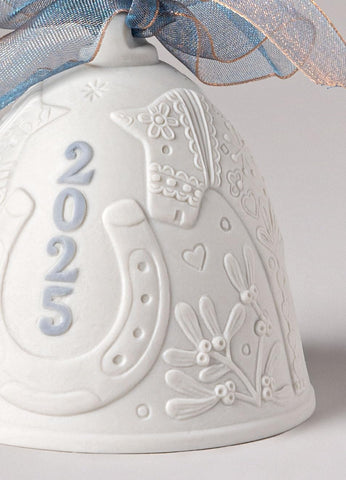 LLADRÓ detail of blue motif on bell emphasizing delicate painted accents