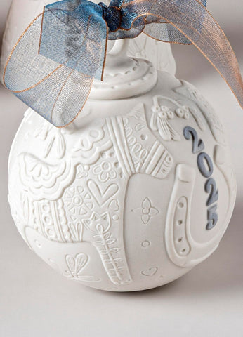 LLADRÓ detail of hand-painted blue accents showing artisan precision and beauty