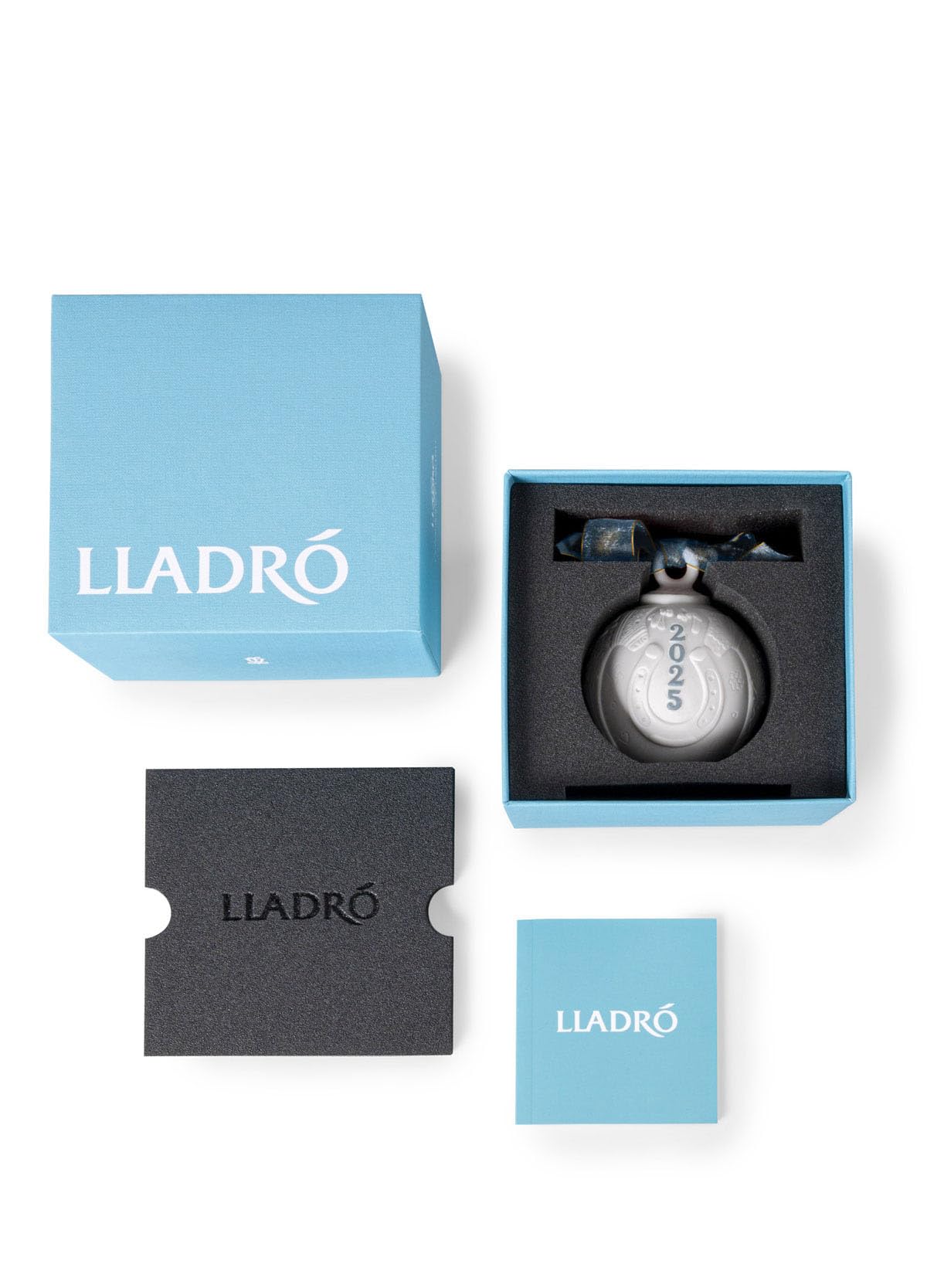 LLADRÓ ball beside packaging for scale and secure gifting presentation