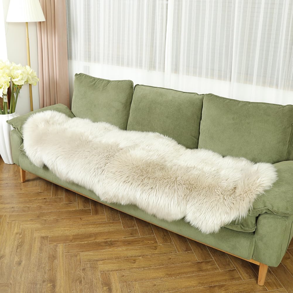LLB rug styled in a living room adding warmth and visual texture to seating