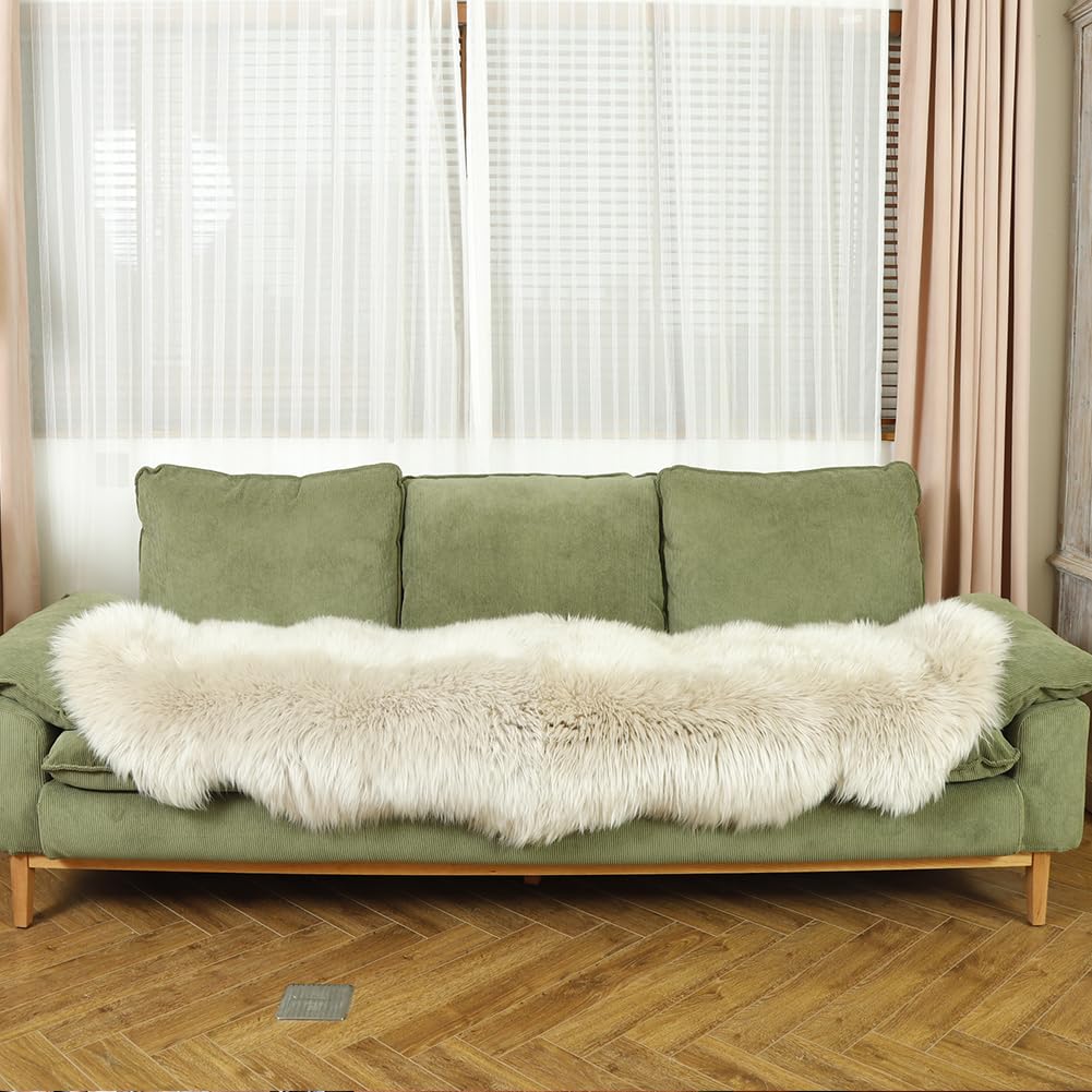 LLB sheepskin draped on a bed creating a soft, comfy feel for bedrooms