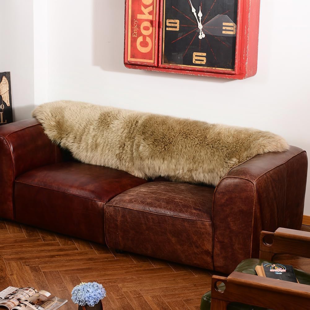 LLB sheepskin draped on bed demonstrating layered decor and softness