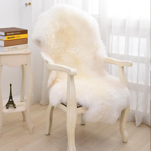 LLB sheepskin draped on sofa adding warmth and visual comfort